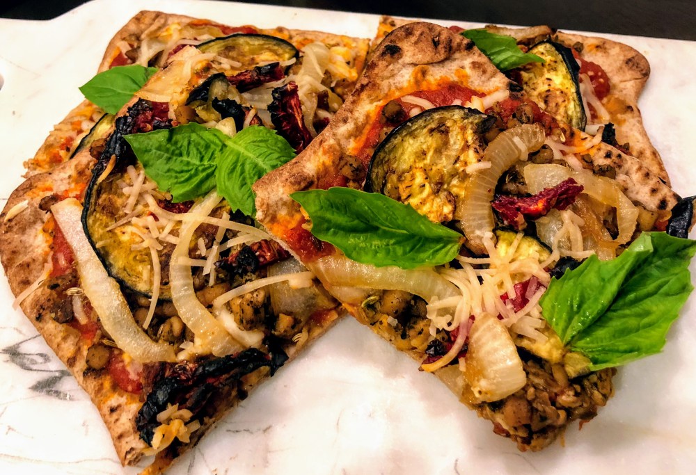Tempeh "Sausage", Caramelized Onion, Roasted Eggplant, and Sundried Tomato Pizza on Whole Wheat Lavash